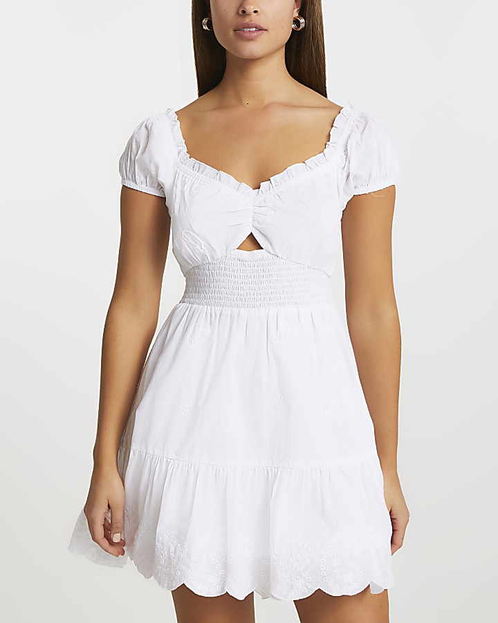 White puff sleeve shirred mini dress