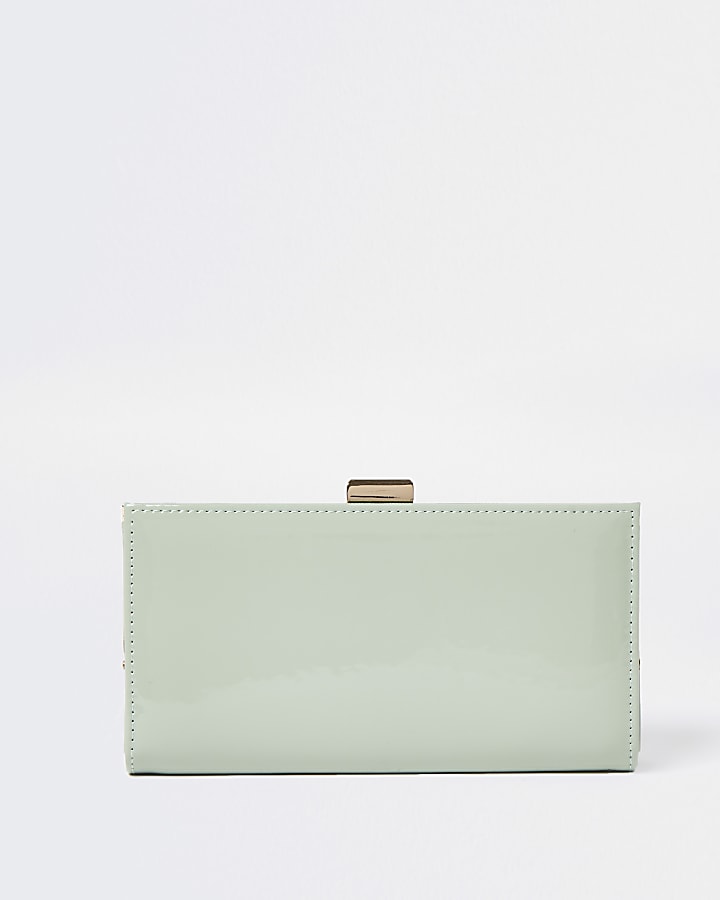 Green RI embossed patent cliptop purse