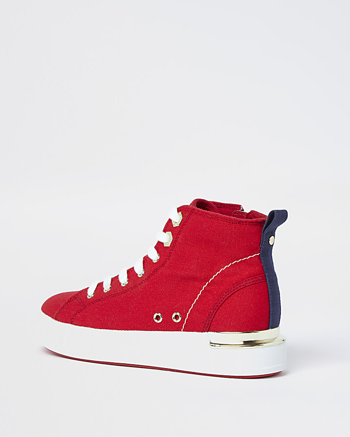 Red canvas high top trainers