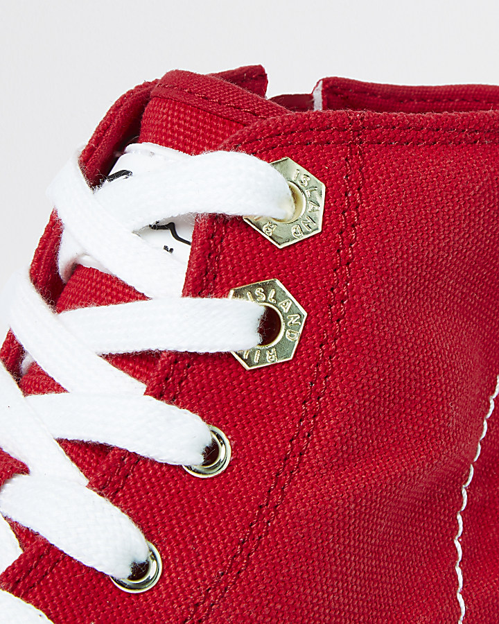 Red canvas high top trainers