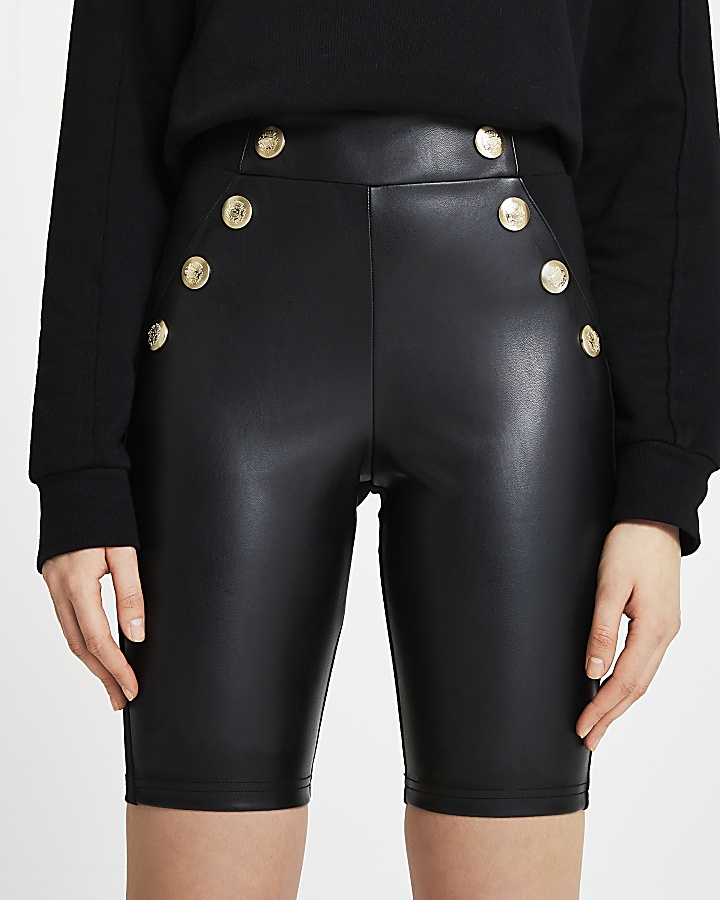 Black faux leather gold button cycling shorts