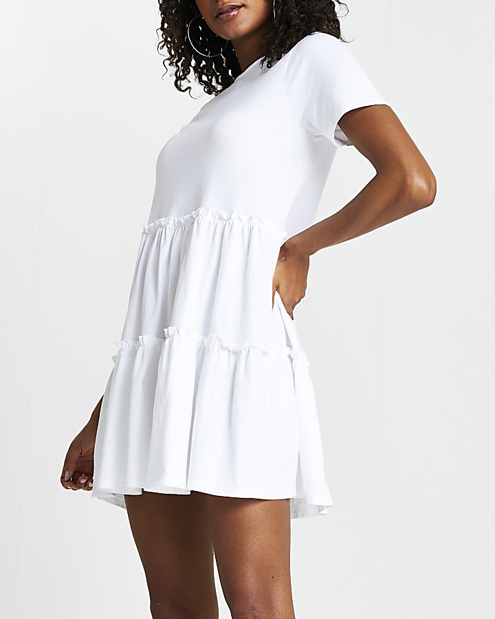 White tiered smock short sleeve mini dress