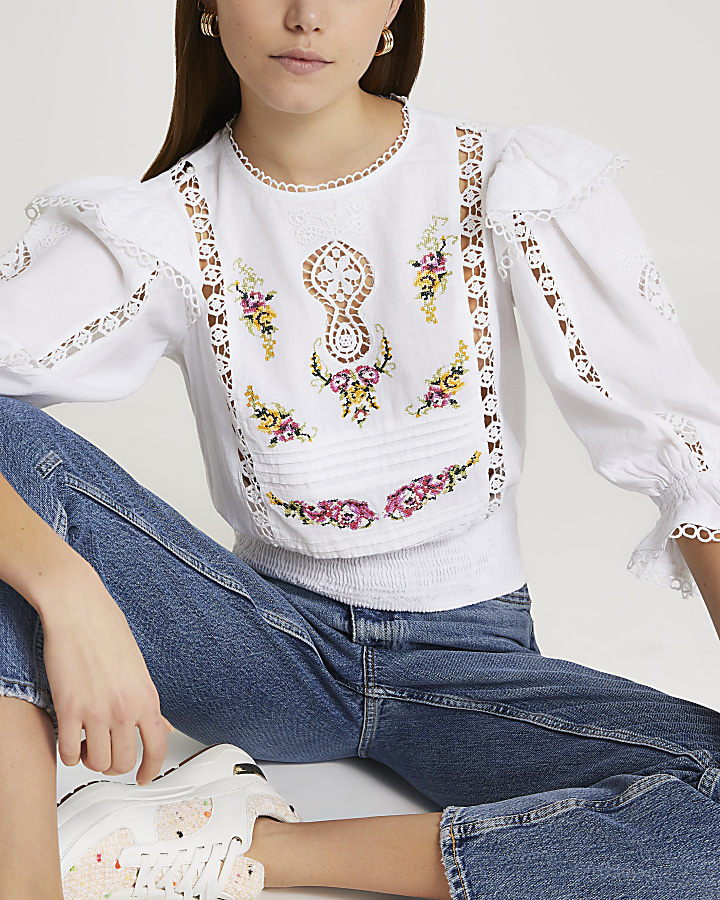 White embroidered frill detail blouse