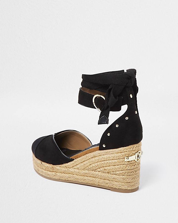 Black studded wedge sandals
