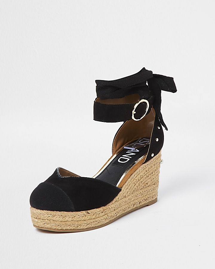 Black studded wedge sandals