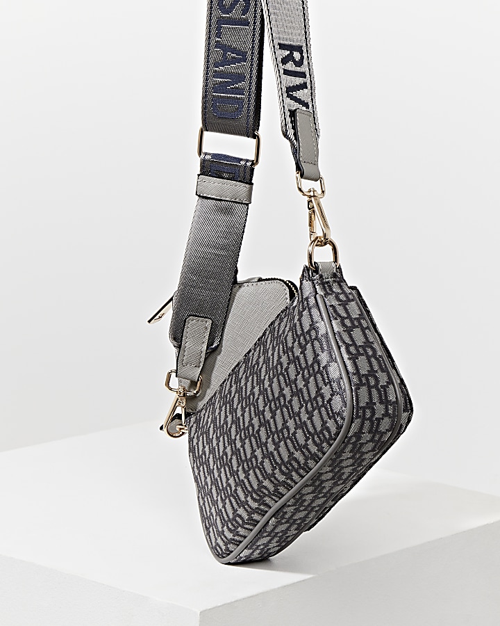 Grey pouchette RI monogram cross body handbag