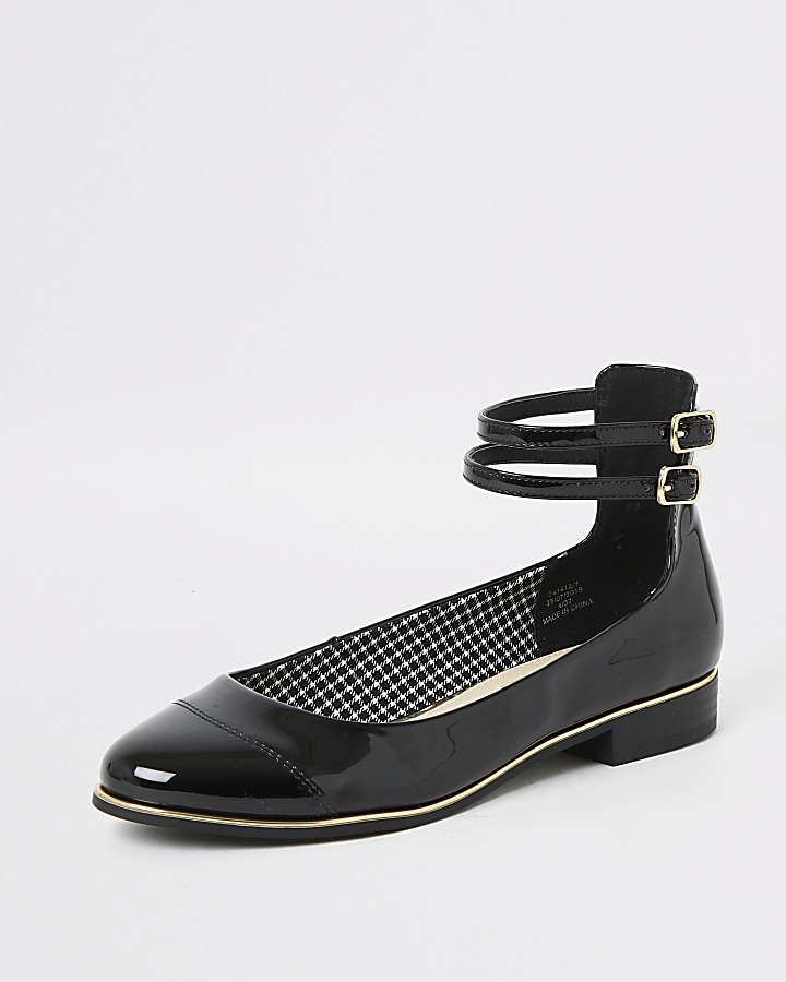 Black ankle strap ballet shoe