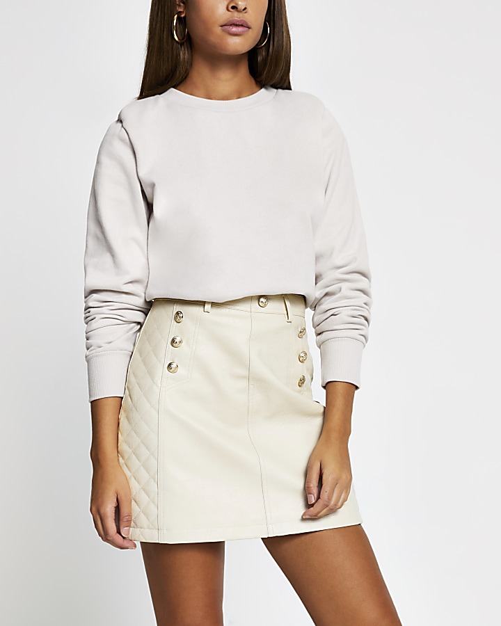 Stone faux leather quilted mini skirt