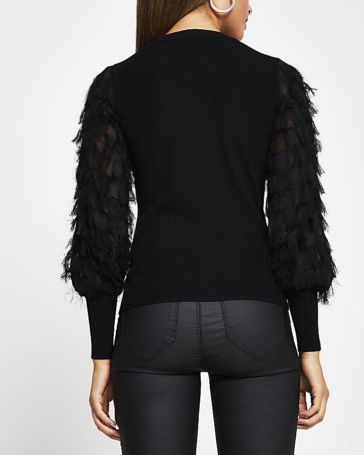Black feather sleeve knitted top