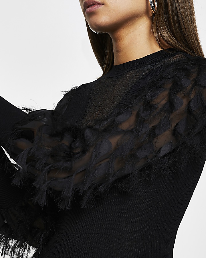 Black feather sleeve knitted top