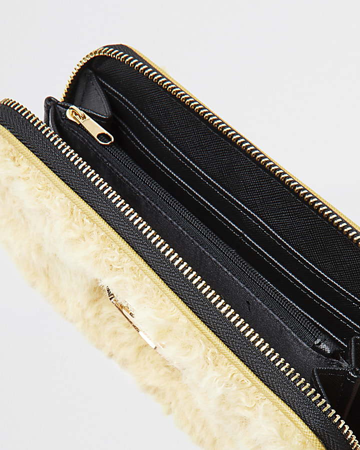 Yellow faux fur zip around purse