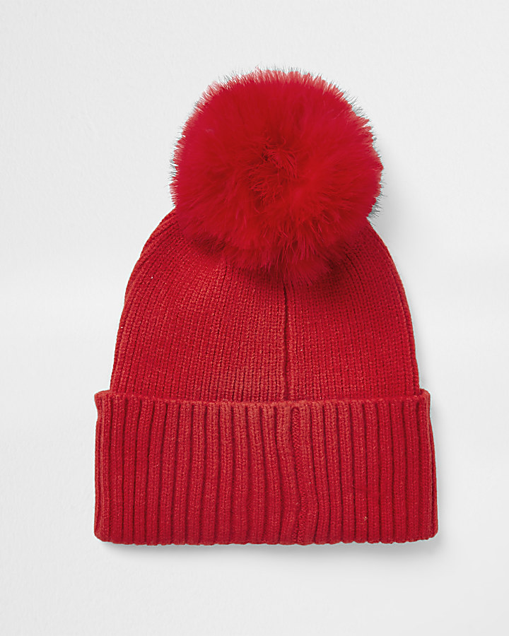 Red faux fur pom pom beanie hat