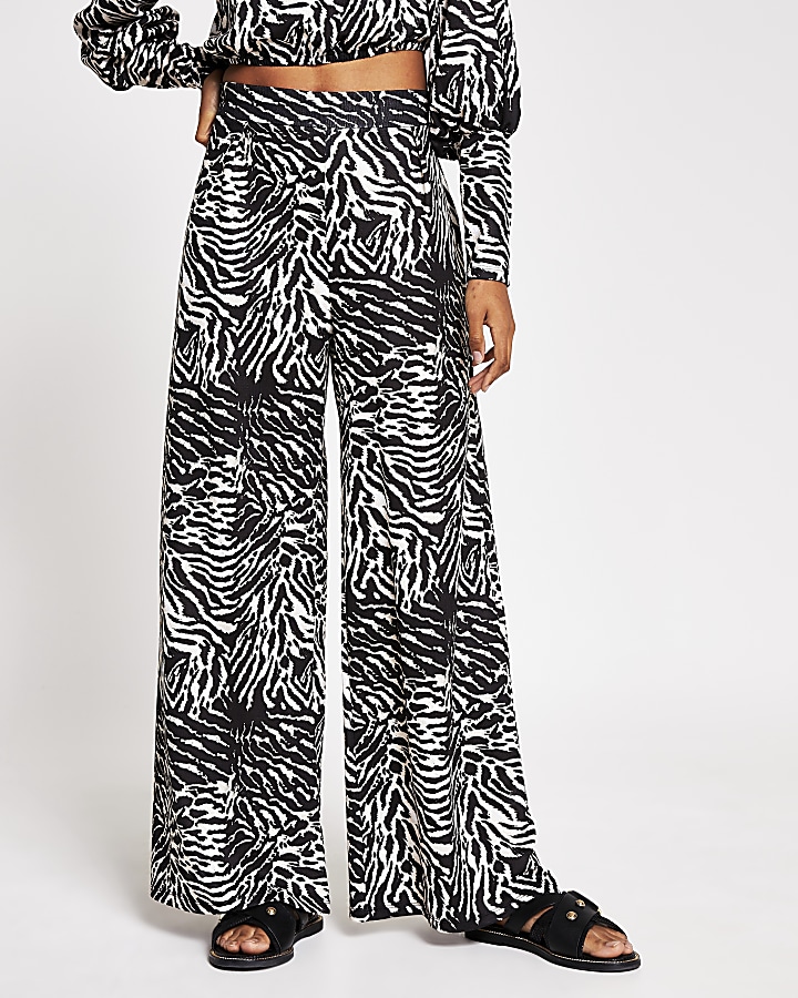 Black zebra print wide leg trousers