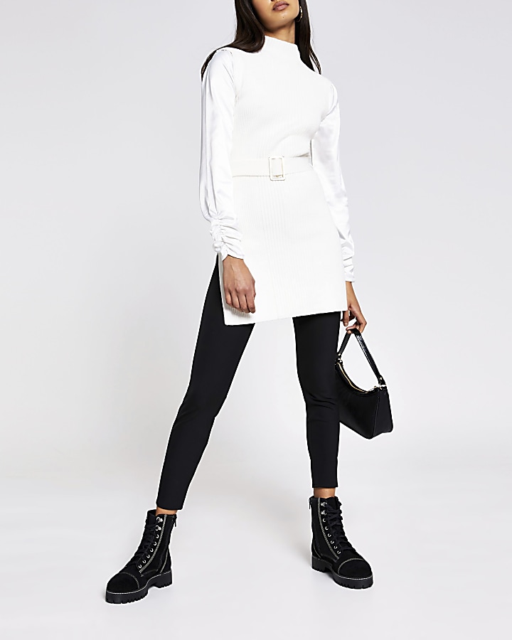White knitted turtle neck belted top