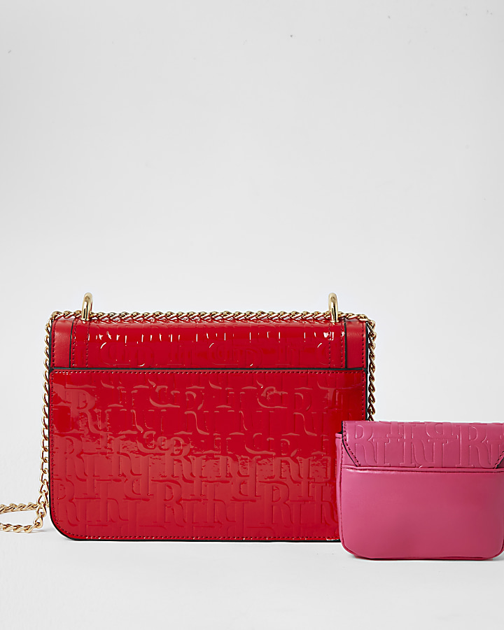 Red embossed satchel with detachable pouch