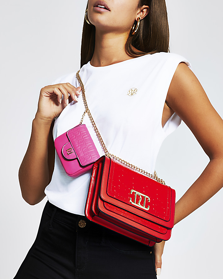 Red embossed satchel with detachable pouch