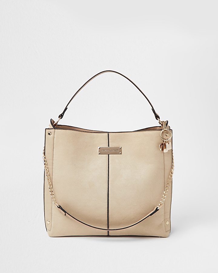 Cream patent embossed slouch bag