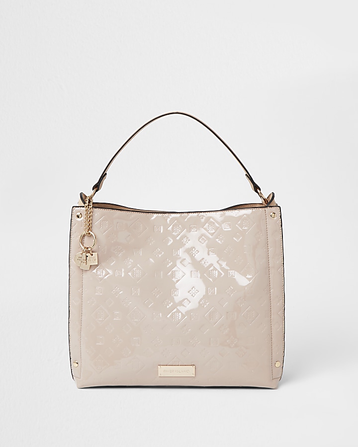 Cream patent embossed slouch bag
