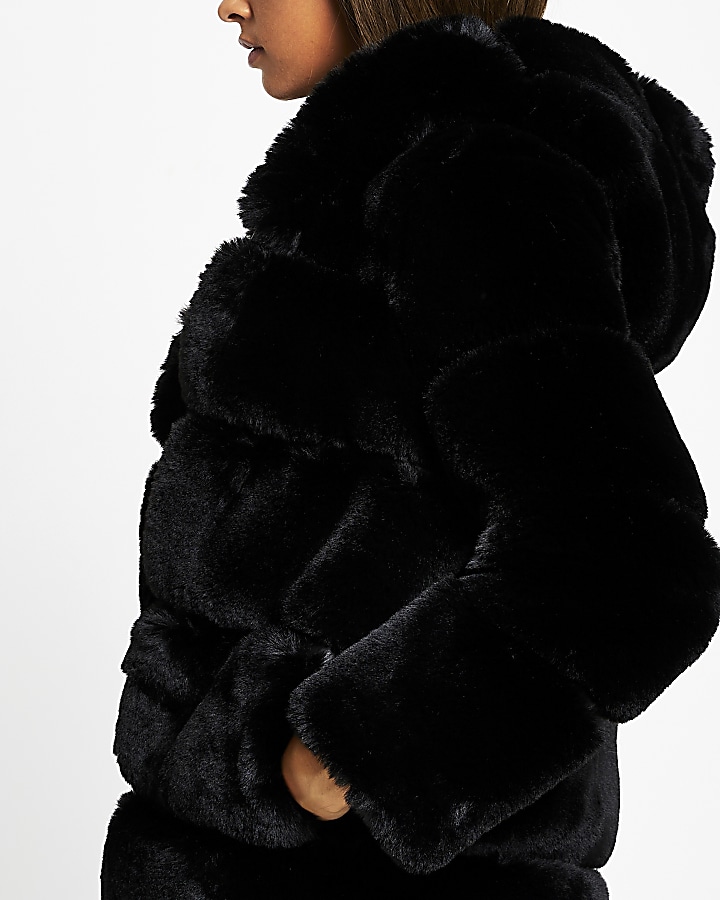 Black panelled hooded faux fur coat