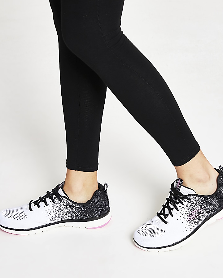 Black Skechers lace up trainers