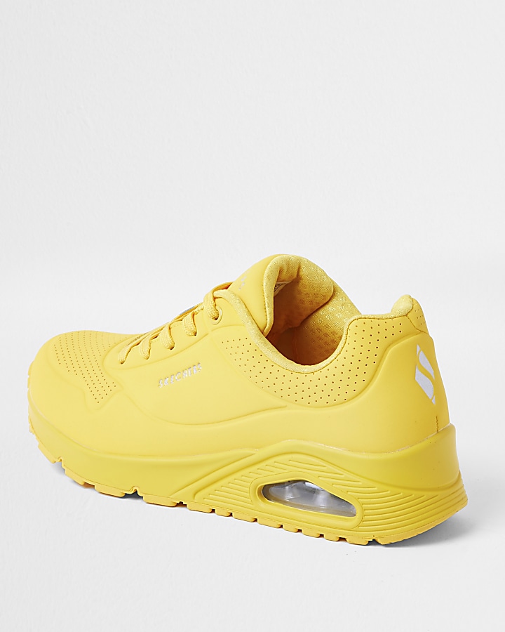 Skechers yellow lace up trainers