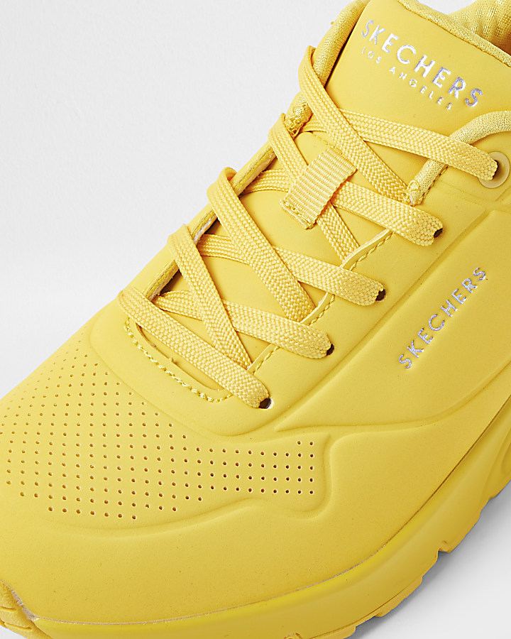 Skechers yellow lace up trainers