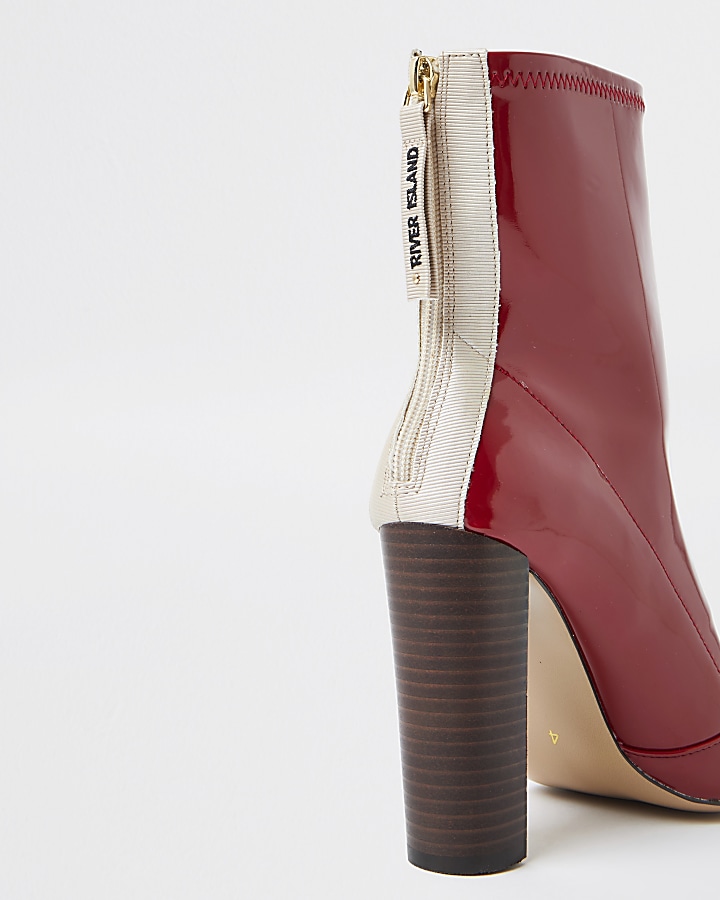Red point toe stitch detail ankle boots