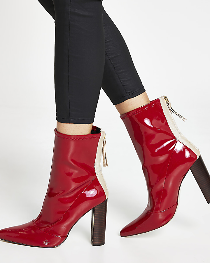 Red point toe stitch detail ankle boots