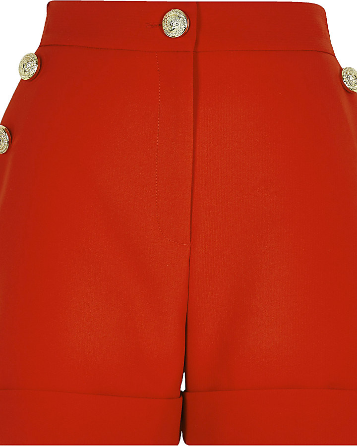Red button front shorts