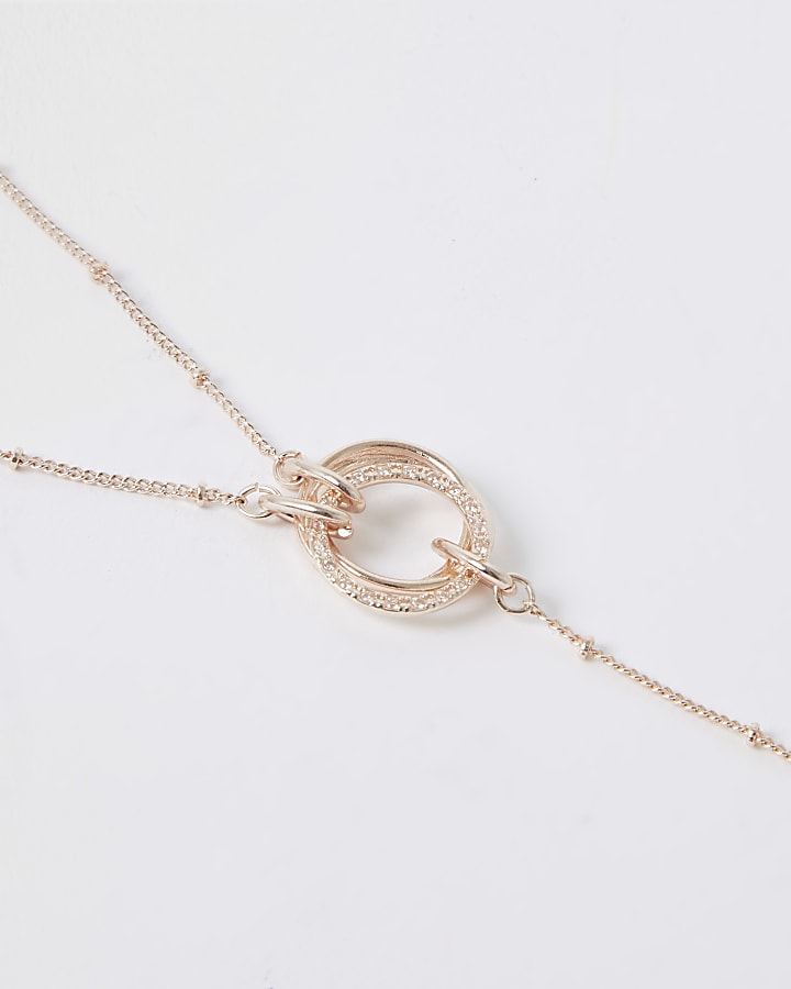 Rose gold pave twist circle necklace