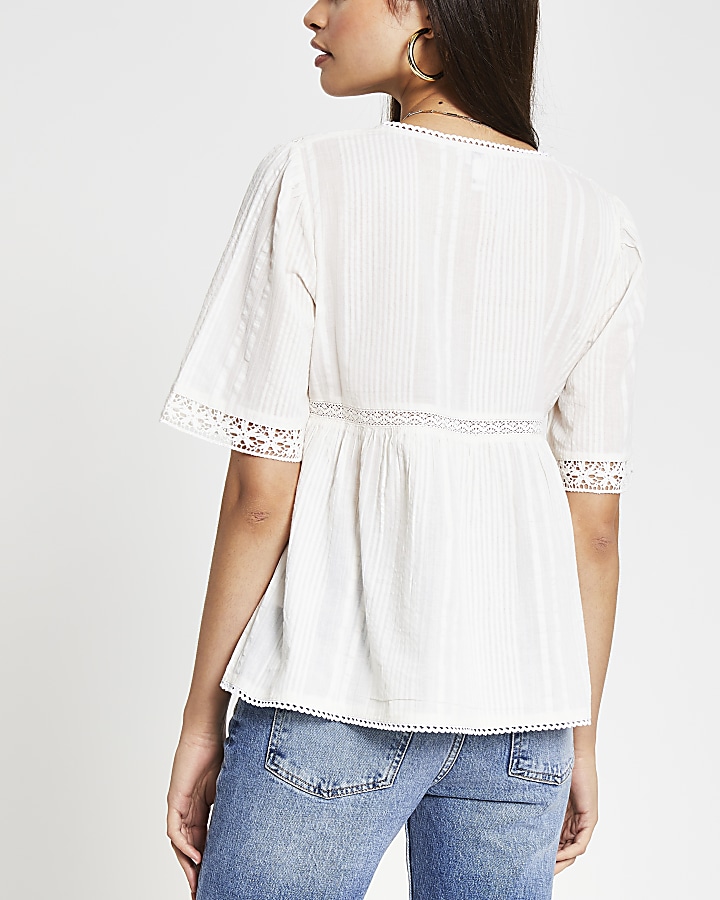 Cream short sleeve embroidery top