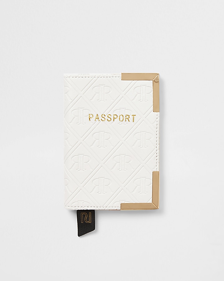 White embossed passport holder