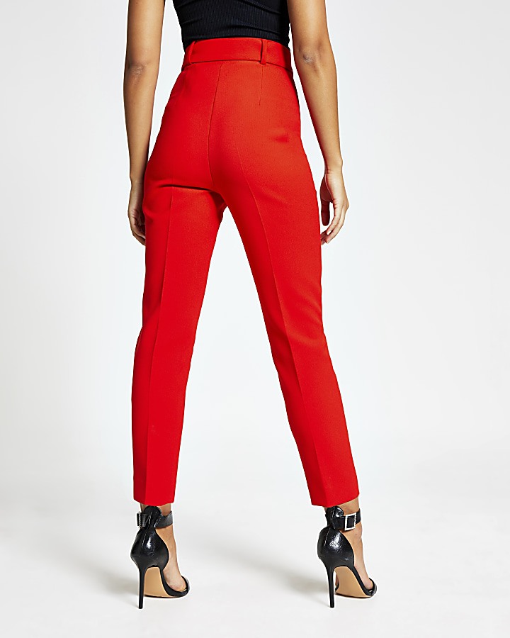Red belted high rise peg trousers