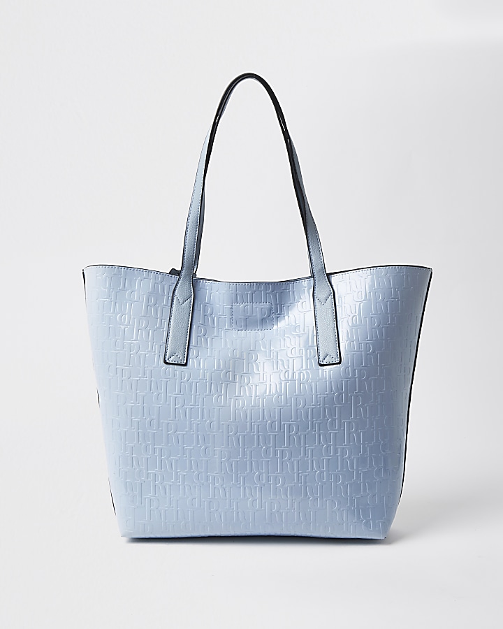 Blue patent RI embossed shopper handbag