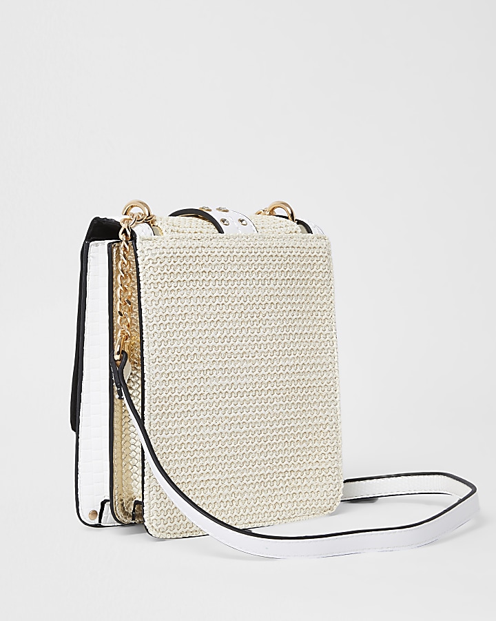 Cream vertical cross body handbag