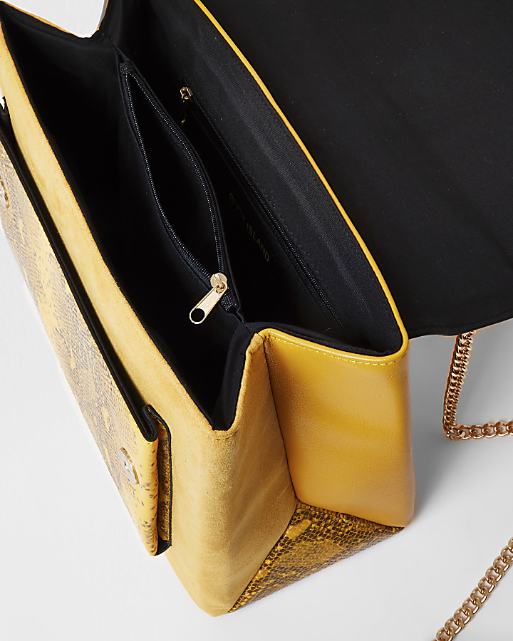 Yellow snake printed cross body handbag
