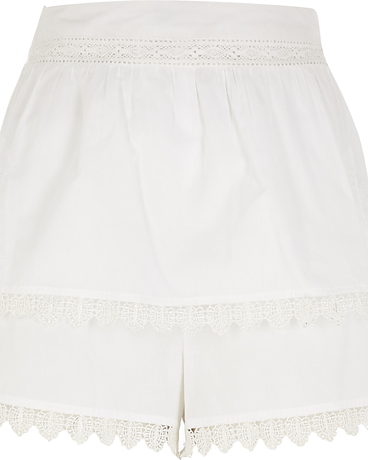White embroidered beach shorts