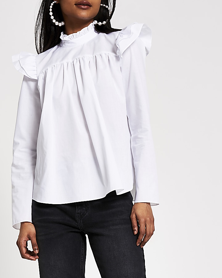 Petite white ruffle shoulder blouse