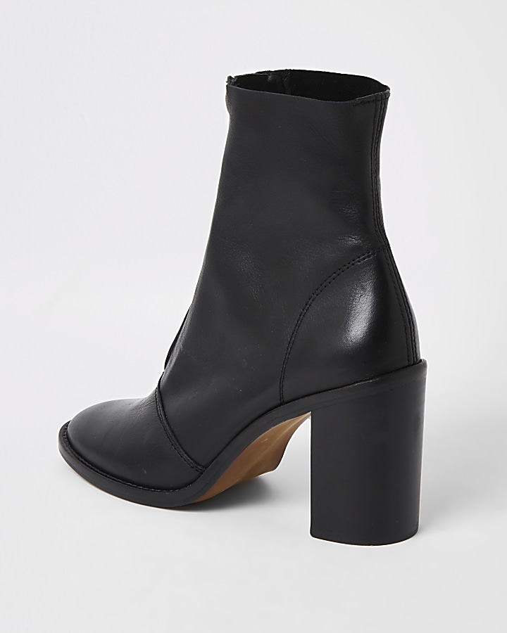 Black leather zip front heeled ankle boots