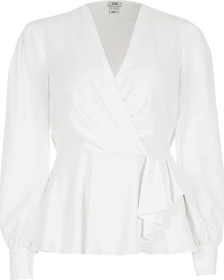White long sleeve peplum wrap blouse