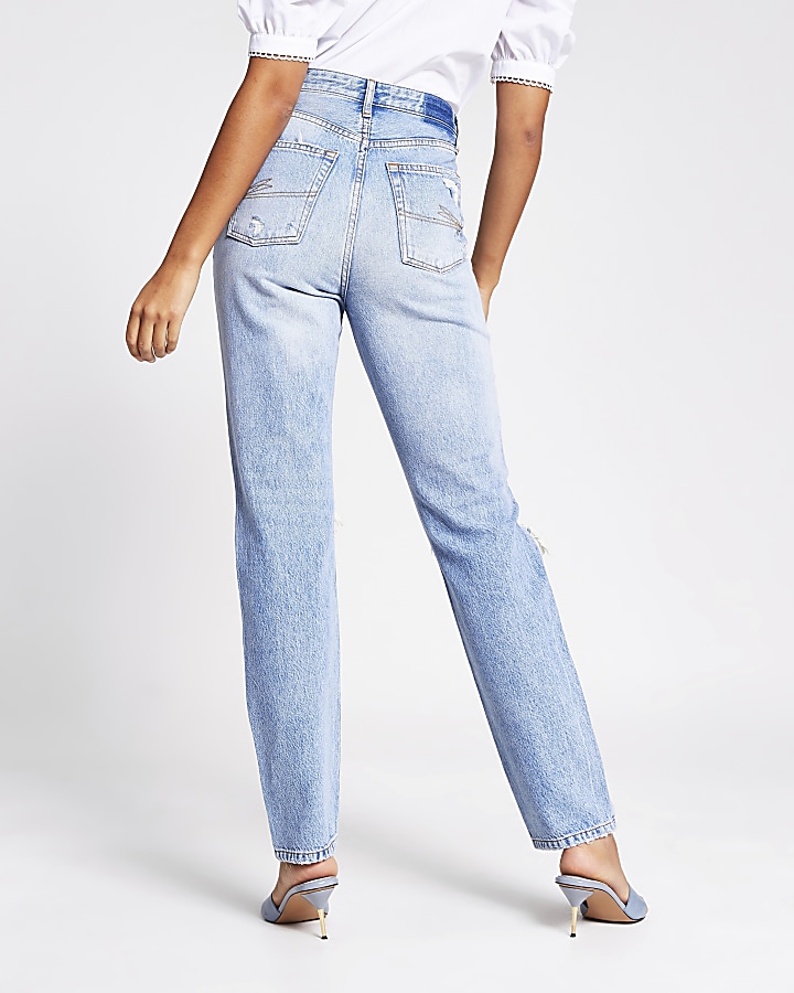 Blue ripped 90s high rise jeans