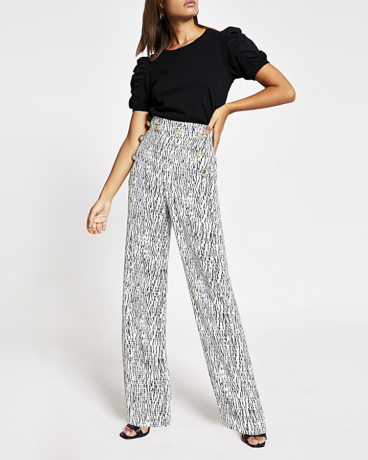 White printed button front wide leg trousers