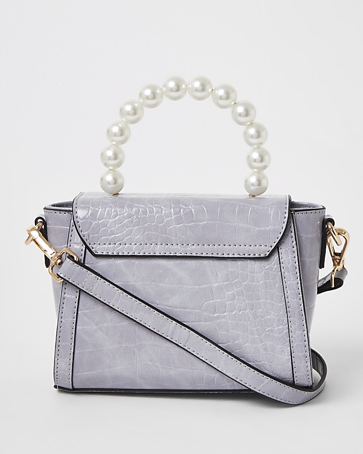 Purple pearl embellished mini bag