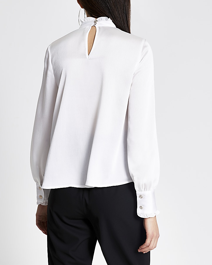 White diamante brooch blouse