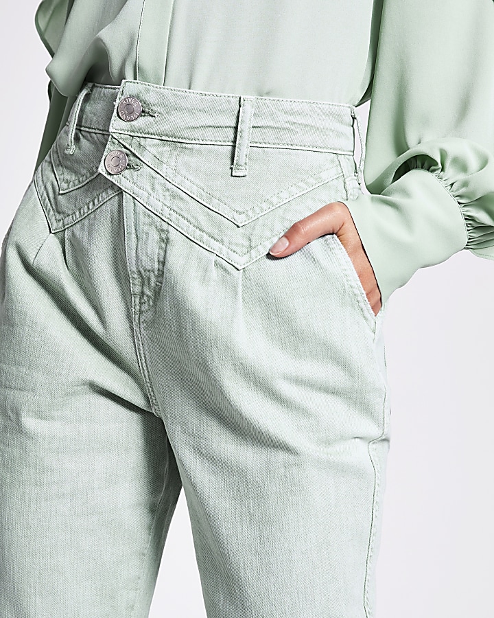 Green high waisted tapered leg jeans
