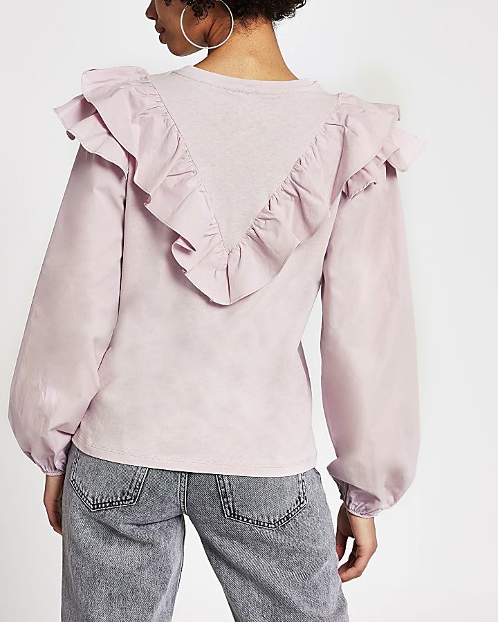 Pink long sleeve frill front blouse