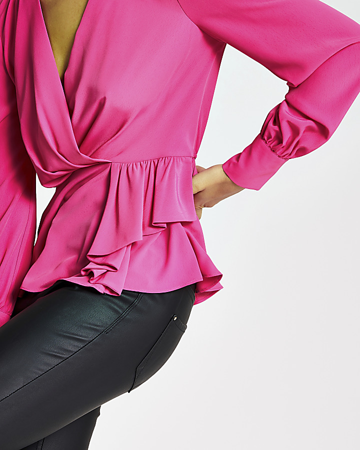 Pink long sleeve peplum blouse
