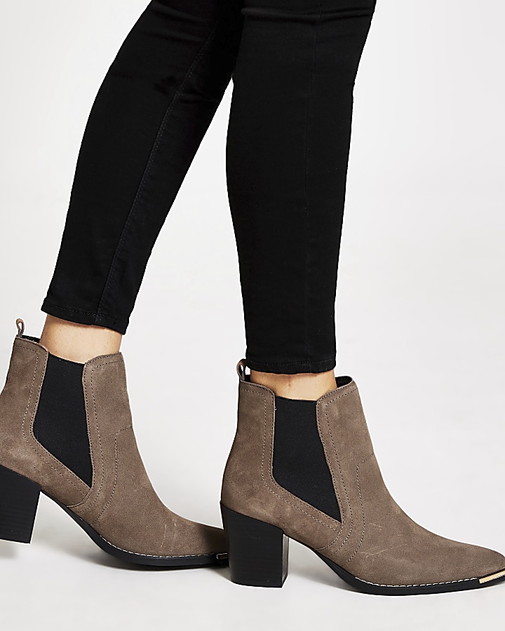 Beige heeled western ankle boots