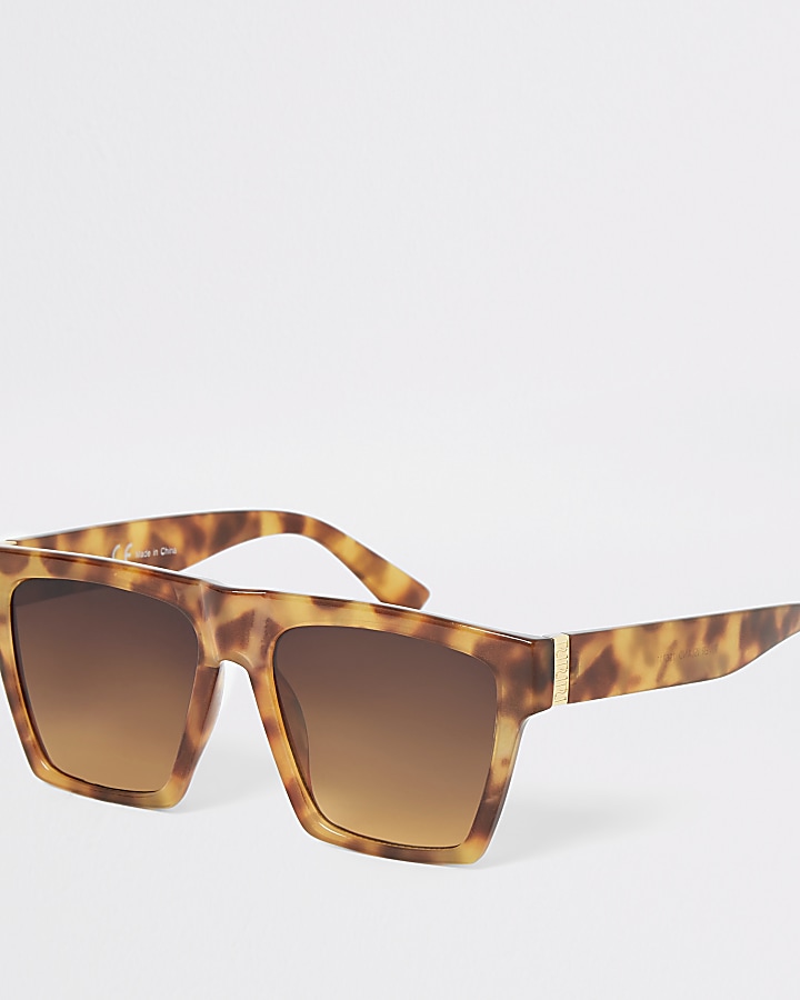 Brown tortoiseshell visor sunglasses