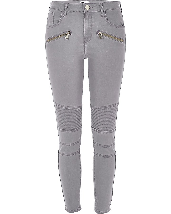 Light grey skinny zip front biker jeans